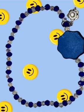 Hand Crafted Blue Beaded Bracelet with Flower Charm